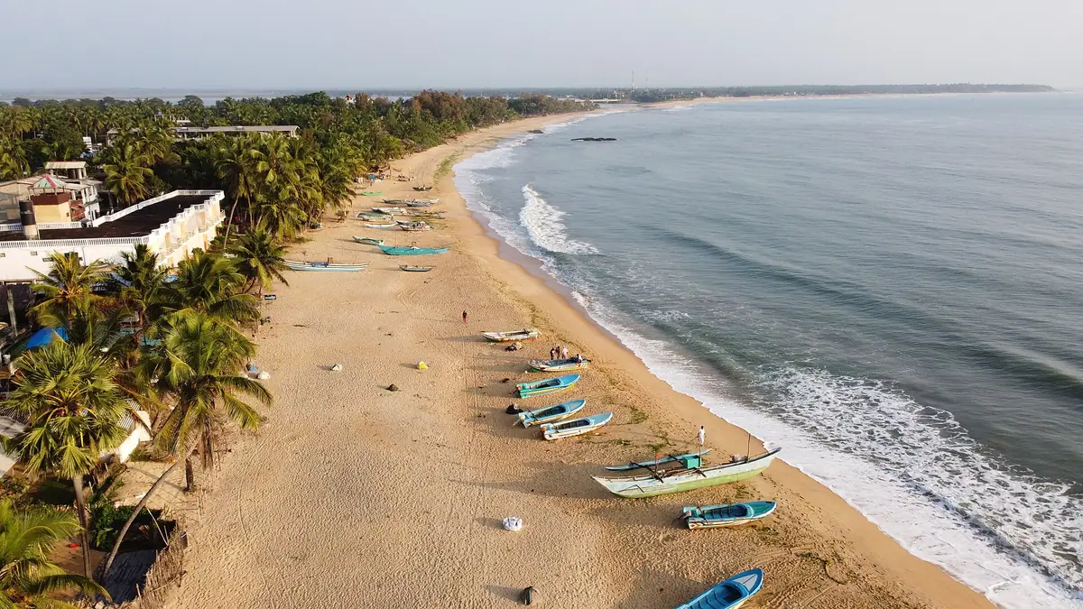 Arugam Bay beach and fishing boats seen from above