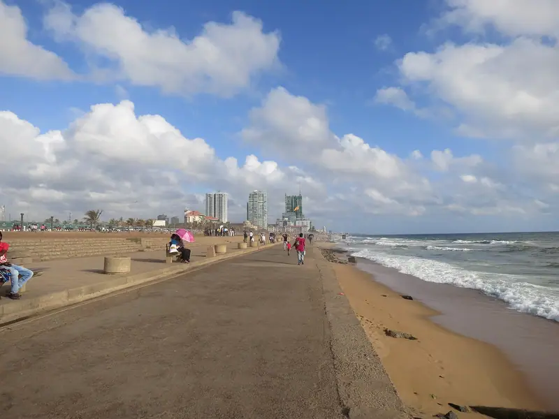 The Galle Face promenade and the Colombo skyline beside the Indian Ocean