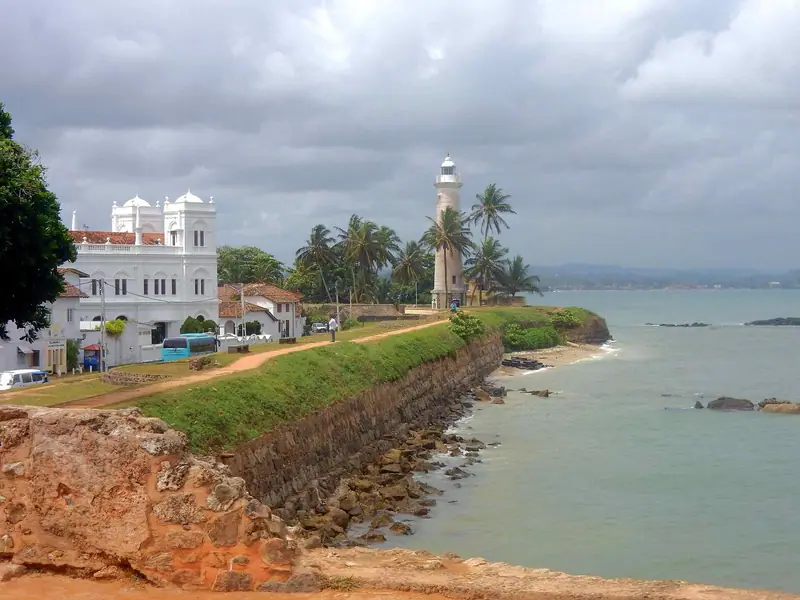 The ramparts of Galle Fort with the lighthouse beyond