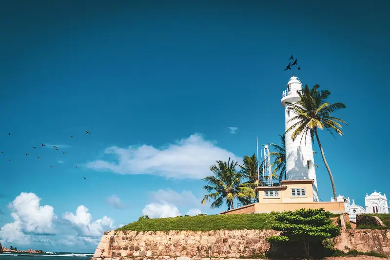 Galle lighthouse standing on the fort walls