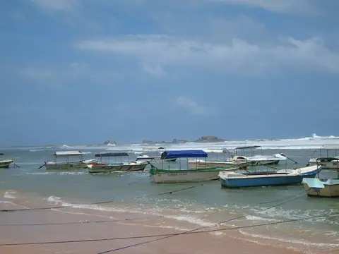 Fishing boats pulled up on the beach at Hikkaduwa