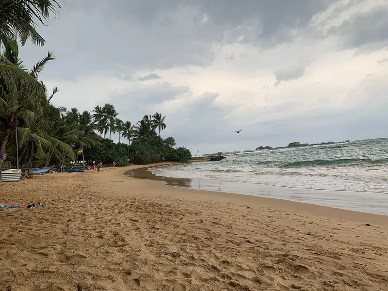 The long sandy beach at Hikkaduwa