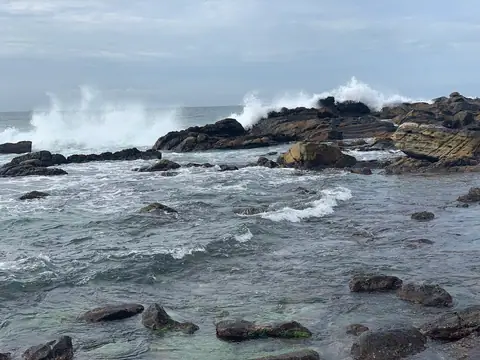 Waves breaking over the rocks on Dickwella beach, beside Hiriketiya