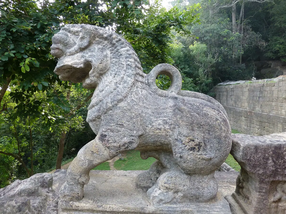 A stone lion guarding the stairs at Yapahuwa