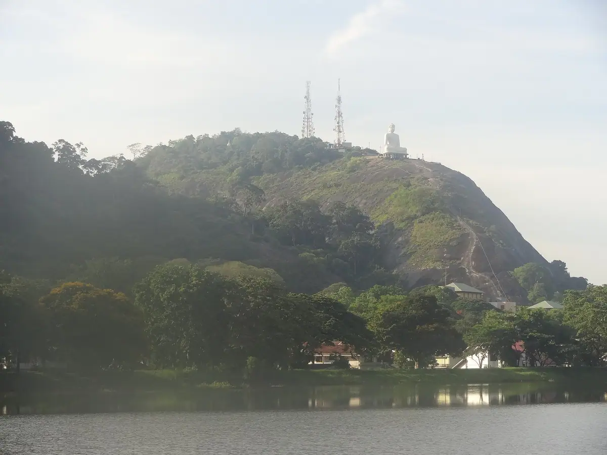 Ethagala, the Elephant Rock above Kurunegala, seen across a lake