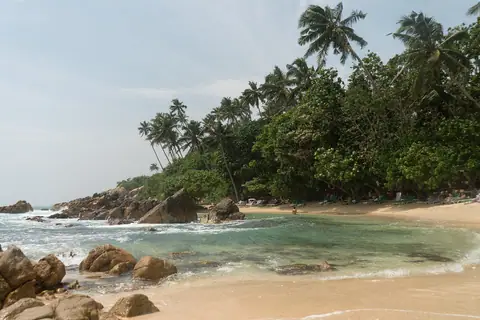 The small rocky cove at Secret Beach, Mirissa