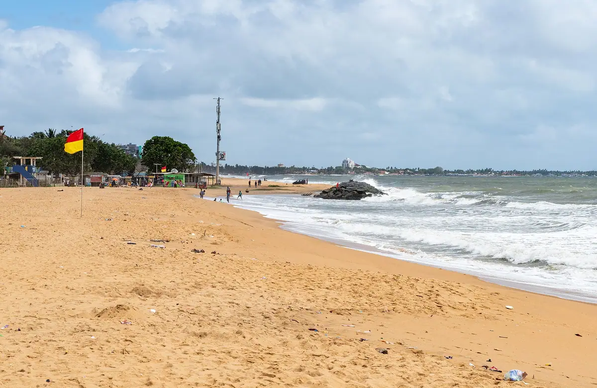 The wide sandy beach at Negombo, looking towards the town