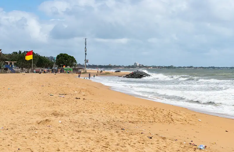The wide sandy beach at Negombo, looking towards the town