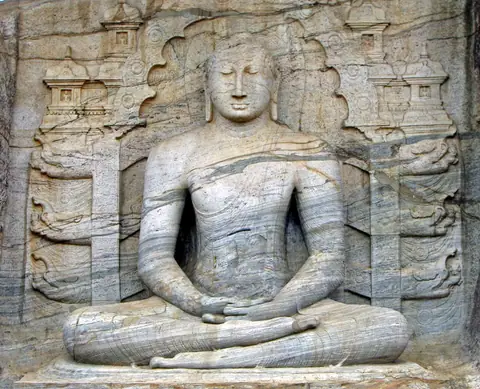 The seated Buddha carved into the rock face at Gal Vihara