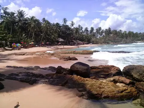 The sandy cove of Goyambokka beach