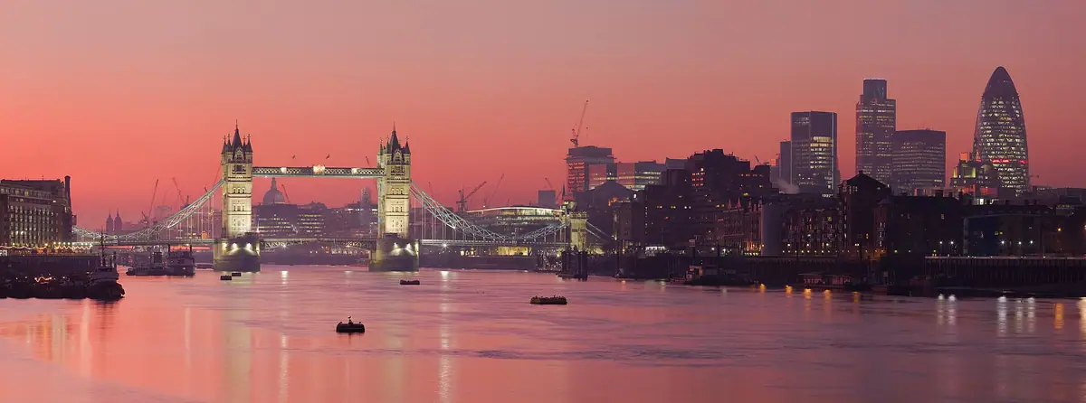 Tower Bridge and the City of London at sunset